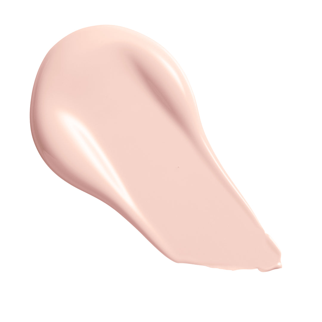 Swatch of Revolution Conceal & Define Soft Matte Tube Foundation in a light shade on a white background.