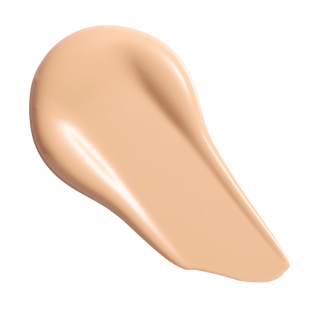 Revolution Conceal & Define Soft Matte Tube Foundation in a smooth swatch showing the creamy texture and natural shade.