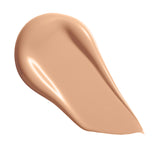 Swatch of Revolution Conceal & Define Soft Matte Tube Foundation in a smooth, creamy texture for even skin tone.