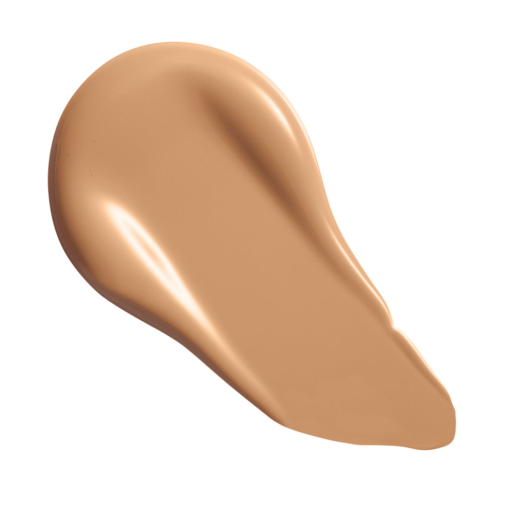 Revolution Conceal & Define Soft Matte Tube Foundation swatch showing smooth, creamy texture in a warm shade.