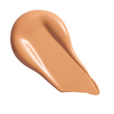 Revolution Conceal & Define Soft Matte Tube Foundation swatch on a white background, showcasing its smooth texture.