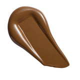Revolution Conceal & Define Soft Matte Tube Foundation swatch in a rich brown shade
