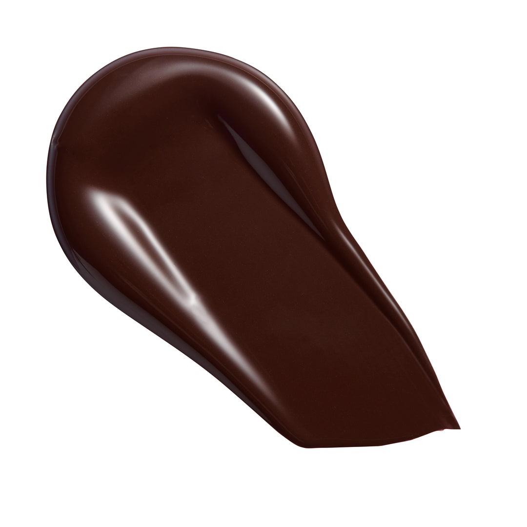Revolution Conceal & Define Soft Matte Tube Foundation swatch showing rich dark shade.