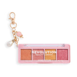 Revolution Icon Edit Mini Eyeshadow Palette with candy-inspired shimmer pigments and chic collectible charm.