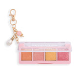 Revolution Icon Edit Mini Eyeshadow Palette with candy-inspired shimmer pigments and cute collectible charm.
