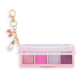 Revolution Icon Edit Mini Eyeshadow Palette with candy-inspired shimmer pigments and cute collectible charm.