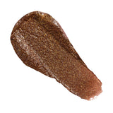 Revolution Sparkly Lip & Cheek Jelly swatch featuring a shimmering brown jelly texture.