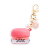 Revolution Sparkly Lip & Cheek Jelly in a cute pot with a charm, perfect for adding shimmer on the go.