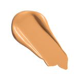 Revolution Conceal and Define Full Coverage Concealer swatch in a warm beige shade on a white background.