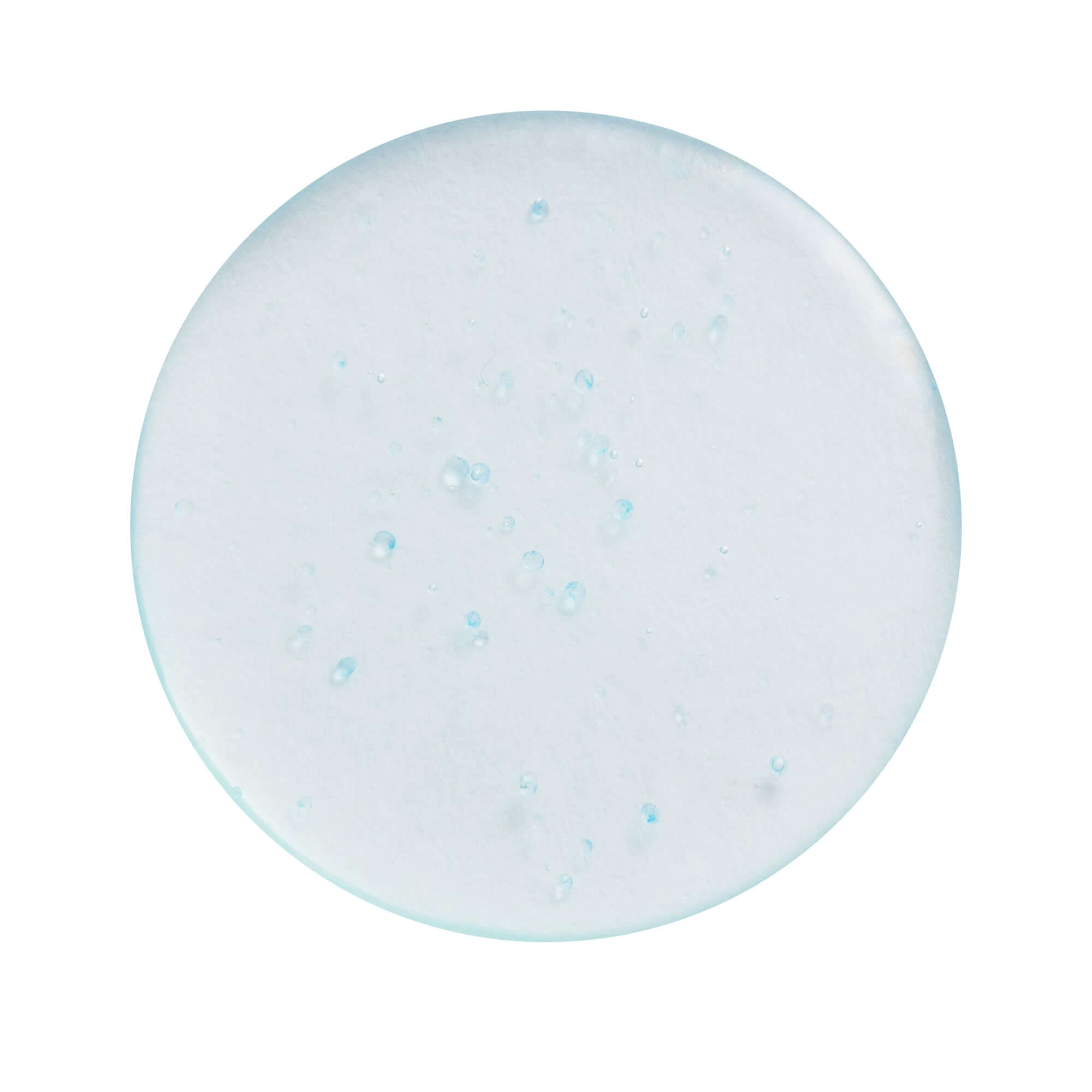 Revolution Dewy Fix PDRN + HA Hydrating Capsule Setting Spray in a round clear dish.
