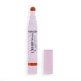 Revolution Fairy Flush Blush Stain in Coral Curse, lightweight liquid blush for a fresh, healthy flush.