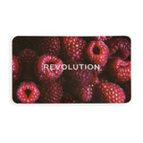 Revolution Forever Flawless Berry Underground Eyeshadow Palette featuring a backdrop of fresh raspberries.