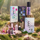 Revolution Halloween Fairy Glow 4-Piece Bundle showcasing Pixie Wing Eyeshadow and Fairy Glow Spray in a forest setting.