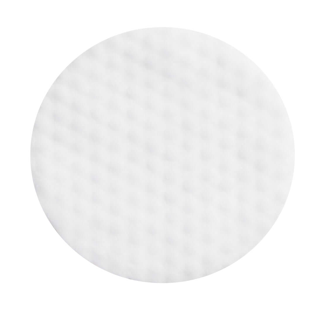 Revolution Pro Miracle No Pore Pads round, textured cotton pad for gentle exfoliation and pore refining.