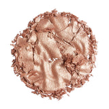 Revolution Reloaded Highlighter in a stunning rose gold shade showcasing a smooth, luminous texture.