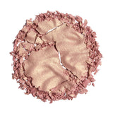 Revolution Reloaded Highlighter loose powder, featuring a talc-free formula for a glowing finish.