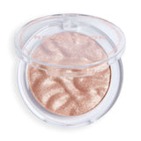 Revolution Reloaded Highlighter in a clear compact, featuring a shimmering, rose-gold powder for a radiant glow.