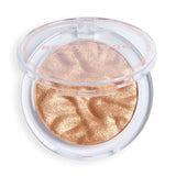 Revolution Reloaded Highlighter in a clear compact, showcasing a shimmering gold powder for a radiant glow.