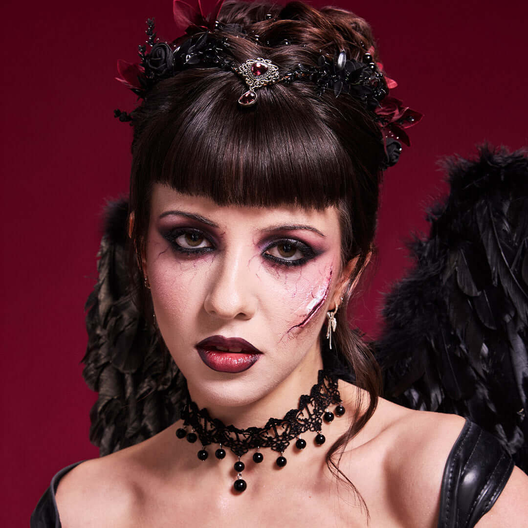 Model demonstrating dramatic Halloween makeup with scars created using Revolution SFX Scar Putty.