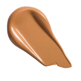 Revolution Superfix Blur Longwear Foundation swatch showcasing a smooth, soft matte texture in a rich caramel shade.