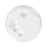 Revolution Pro Miracle 2% Salicylic Acid BHA Anti Blemish Serum drops showcasing its clear, lightweight texture.