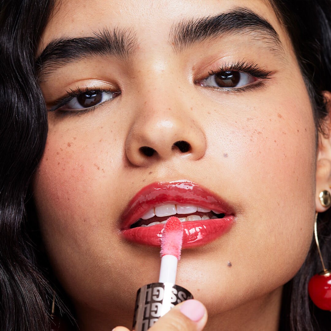 Revolution Pout Bomb Plumping Gloss Cherry Sheer Red