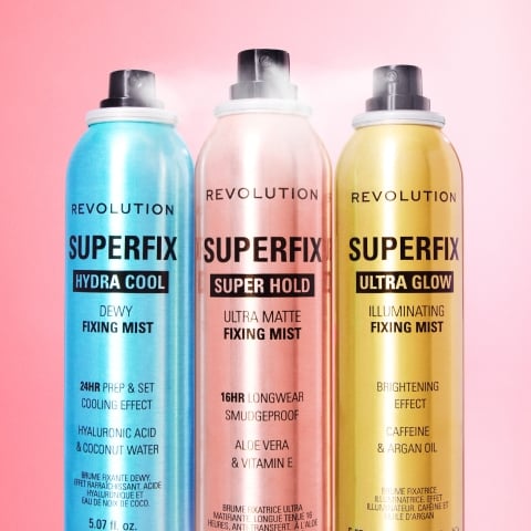 image of Revolution's three Superfix Setting Sprays on a pink background