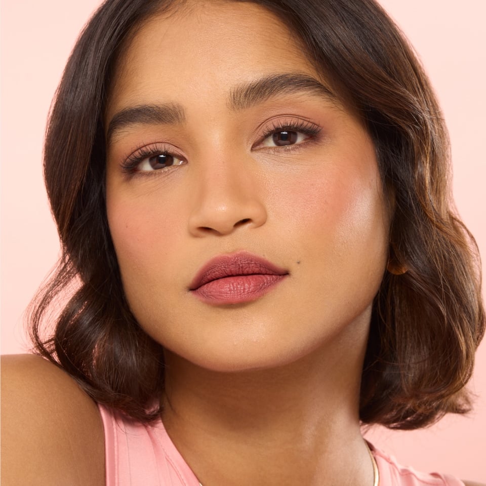 image of woman on a beige background