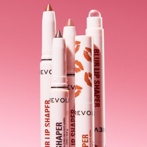 image of Revolution's Blur Lip Shapers on a pink background